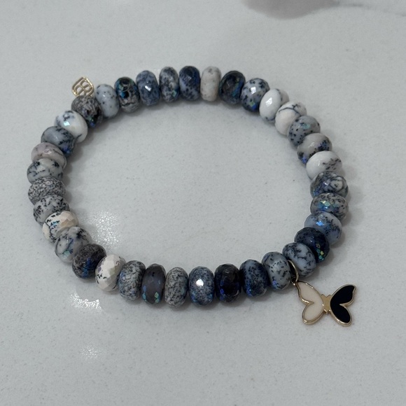 Elegant Blue and White Beaded Bracelet with Butterfly Charm